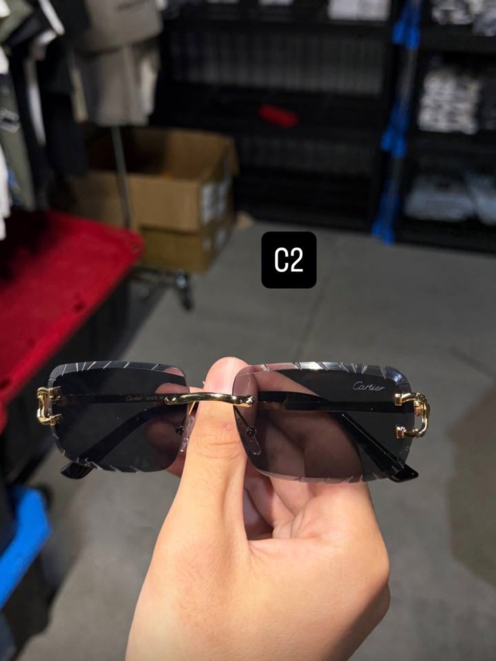 Cartier Men’s Black Sunglasses with Gold Hardware